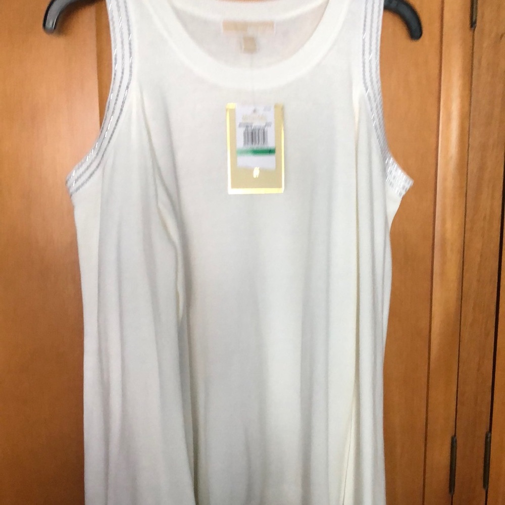 Beautiful long sleeve white sweater for any event.